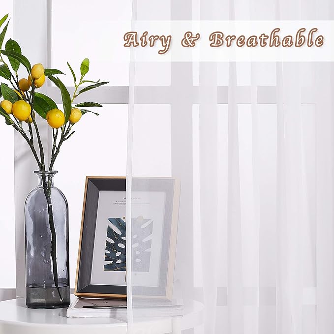 NICETOWN Sheer Curtains for Bedroom Windows 63 inch Length, Grommet Casual Voile Sheer with Light Filter Window Treatments for Living Room, Ivory, 140" Wide Total 2 Panels